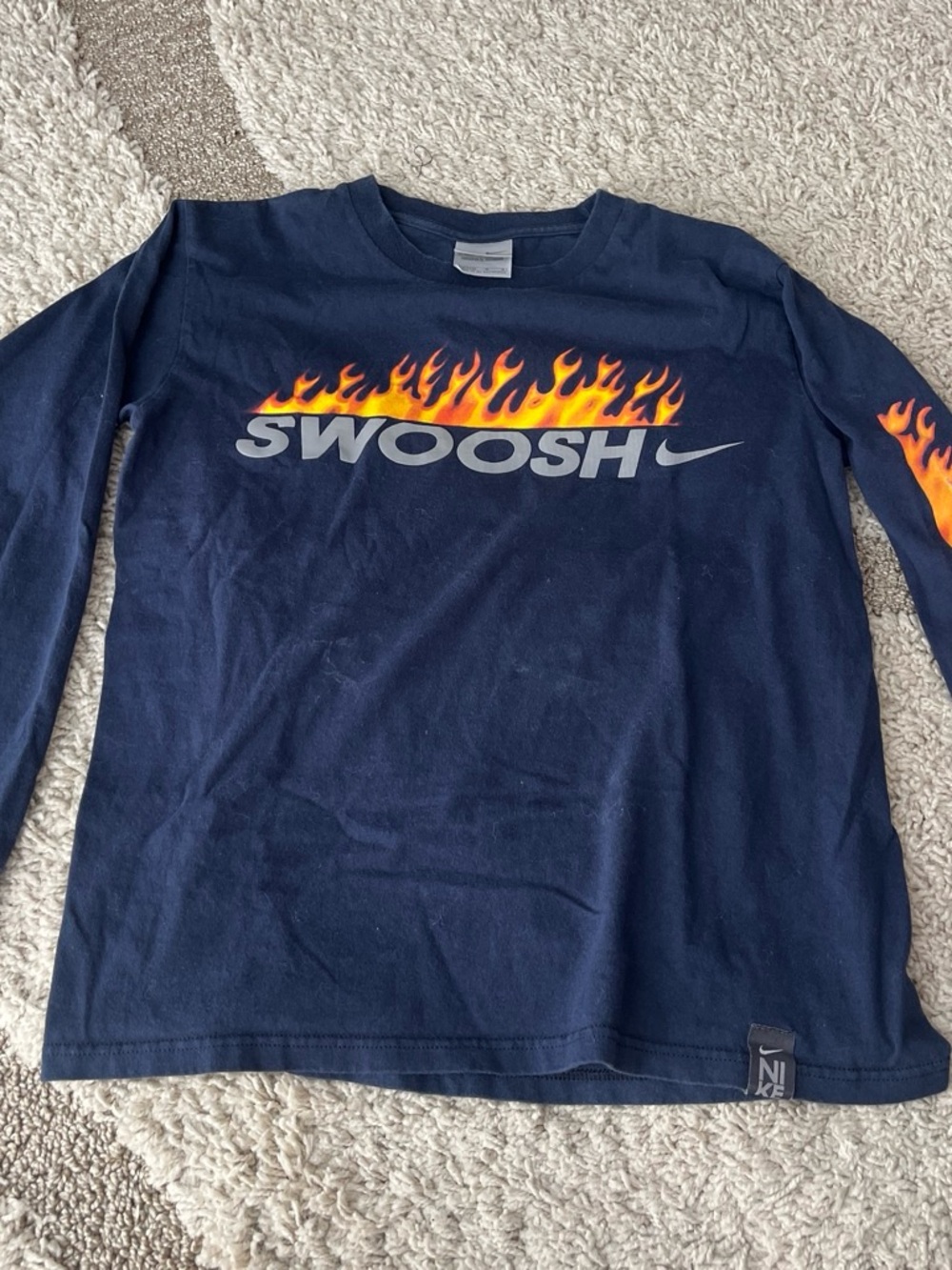 Vintage Nike Kids Navy Long Sleeve Tee with Flame 'Swoosh' Graphic